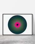 Print entitled 'Penumbra (Fuchsia)' in black frame resting against a white wall.