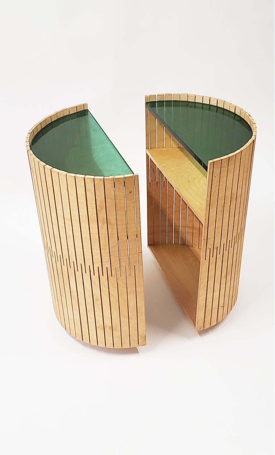 Left-hand view of the side table entitled Laguna Table by Jason Robinson. View highlights the ability to split the table into two parts.